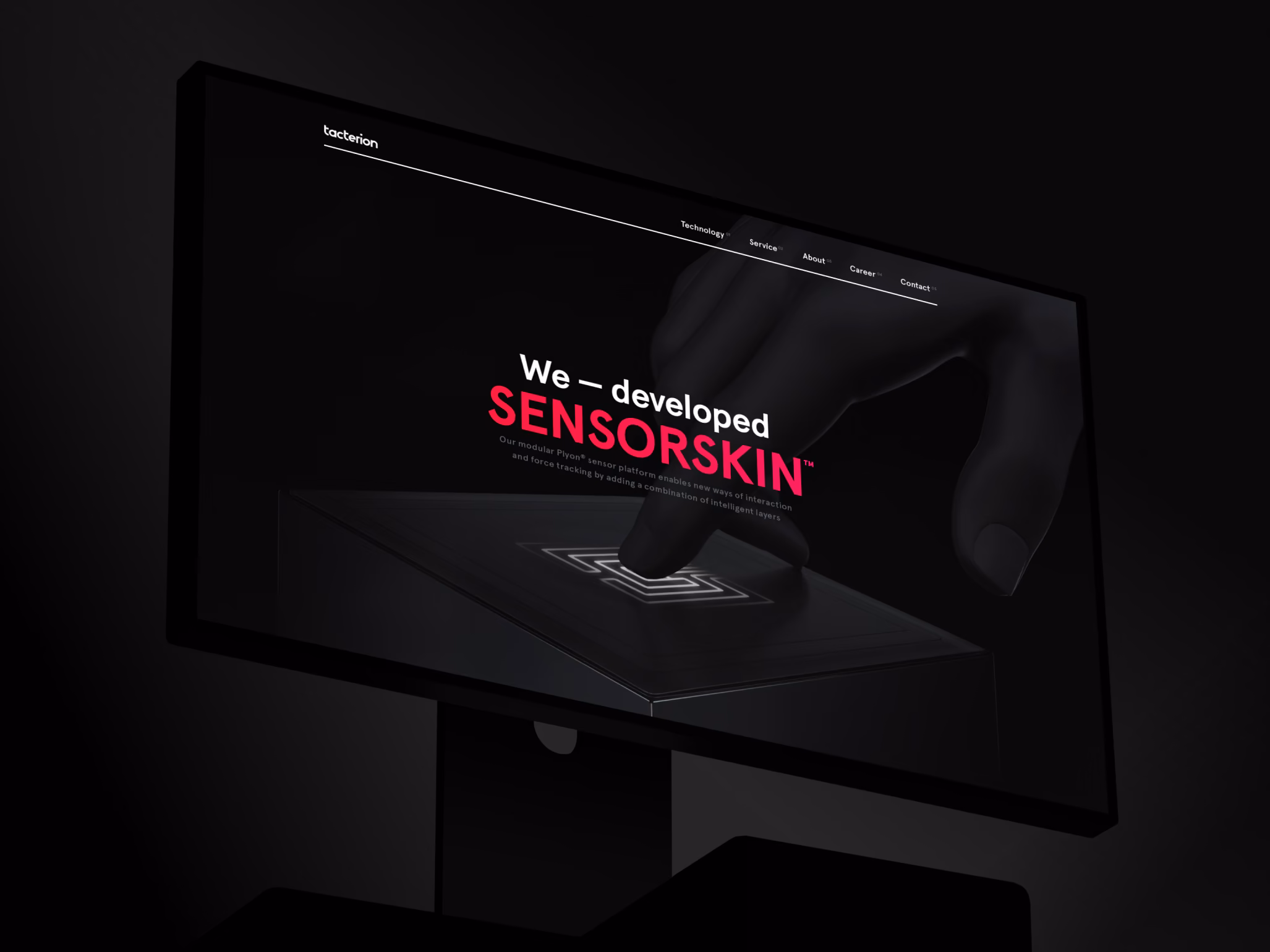 Tacterion's website on a monitor, with the plyon in 3D by FIFTYSEVEN