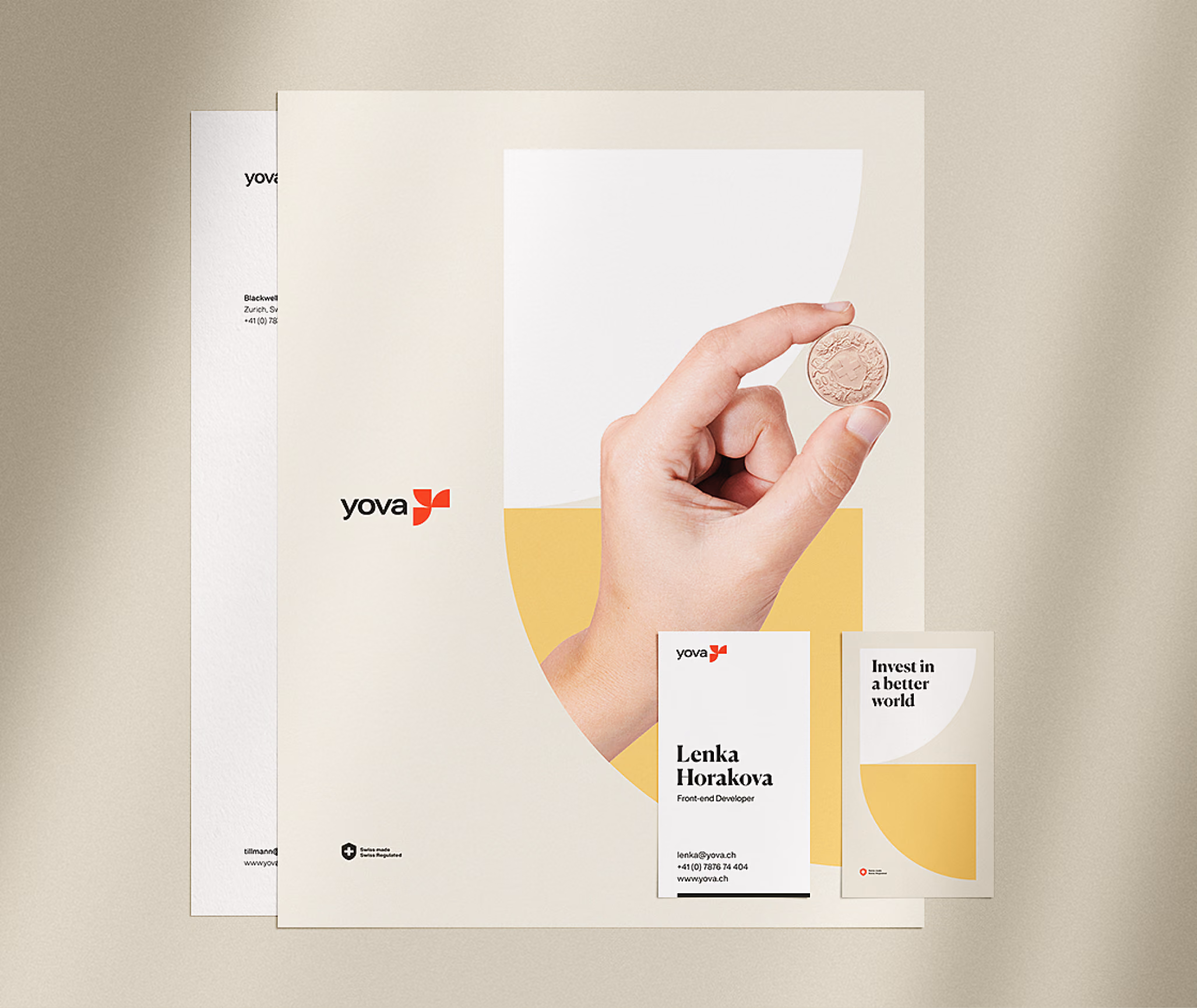 Yova letterhead and business card in hand