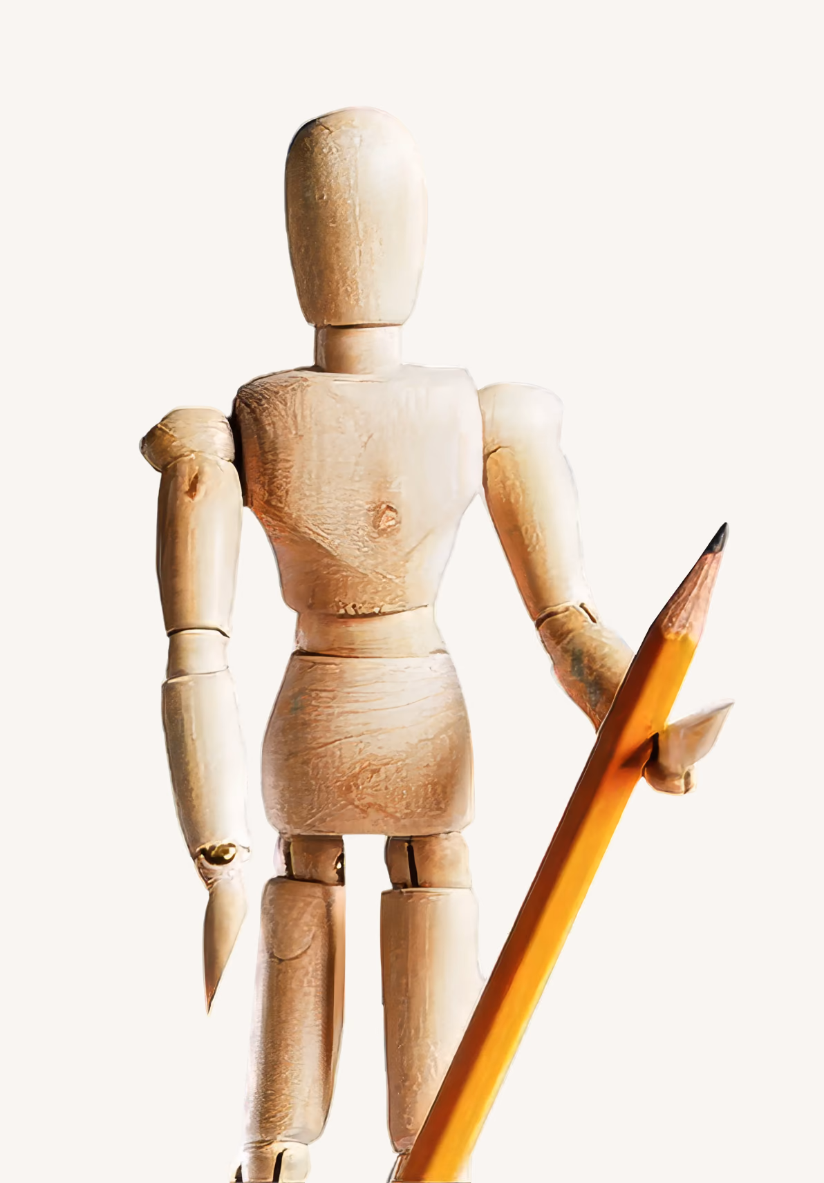 Wooden mannequin with a pencil, a Yova photography prop